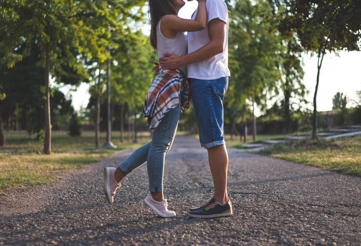 A young couple standing together