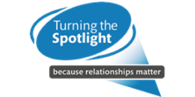 Turning the Spotlight logo